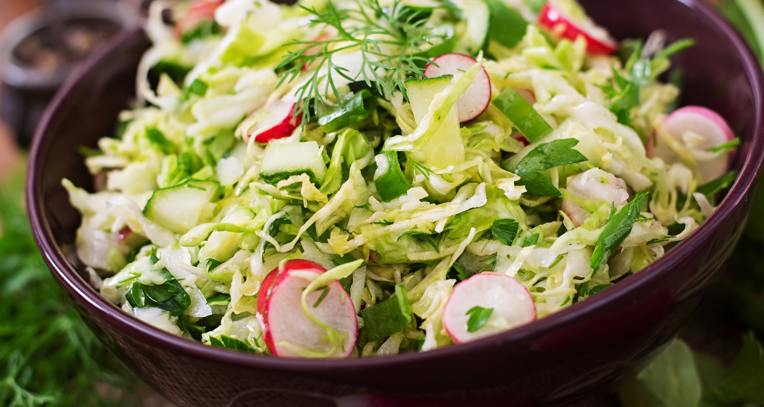 A vibrant salad cabbage slaw with parsley and a tangy lemon dressing