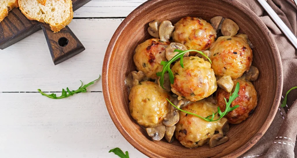 slow cooker tuscan chicken meatballs with gnocchi