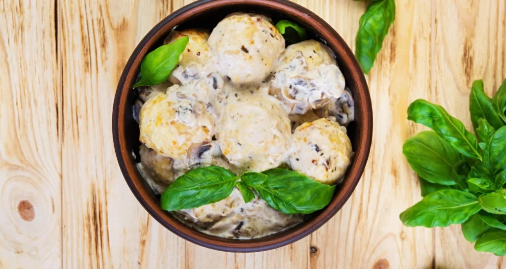 slow cooker tuscan chicken meatballs with gnocchi